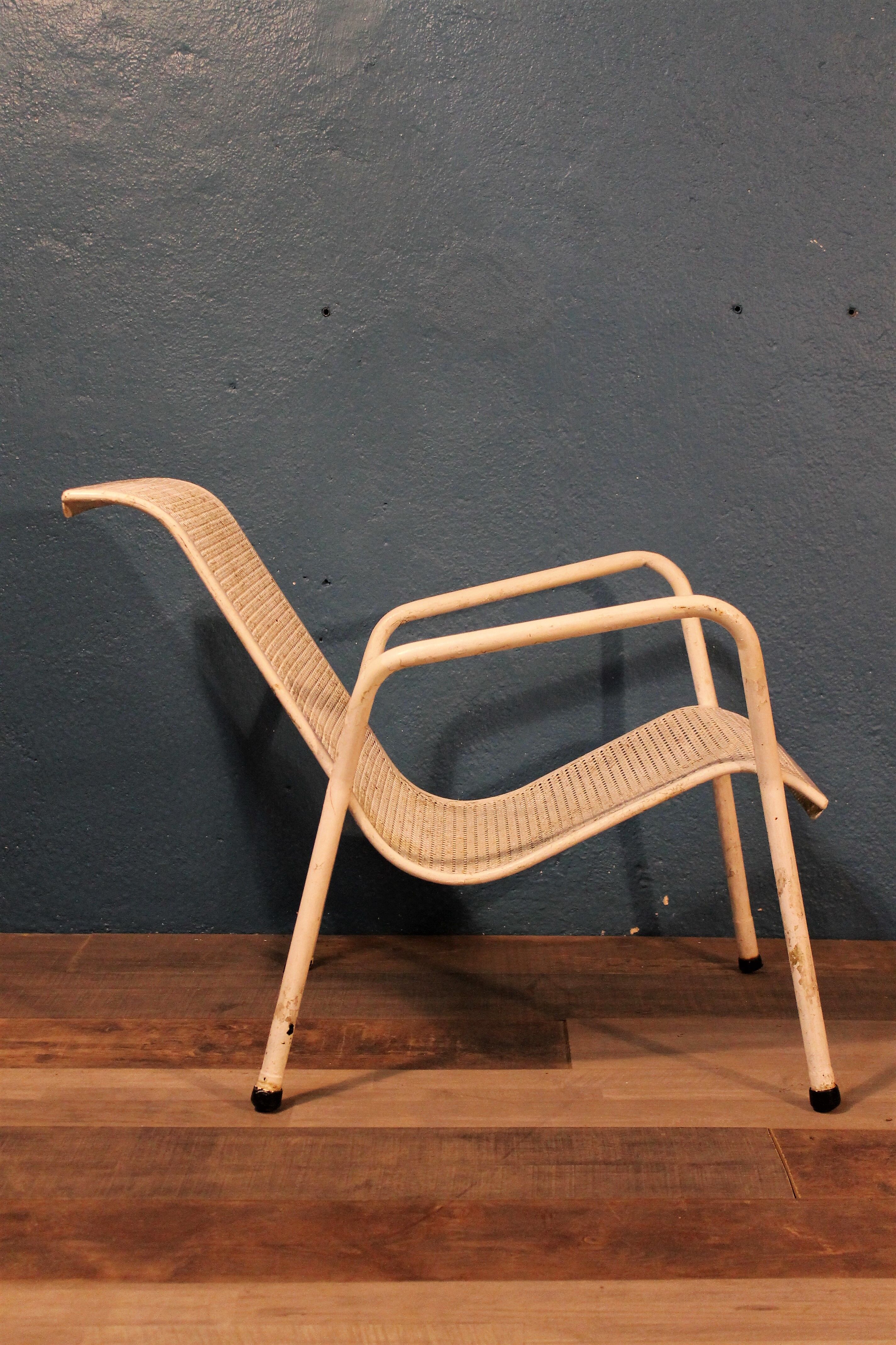 1960 perforated metal garden armchairs