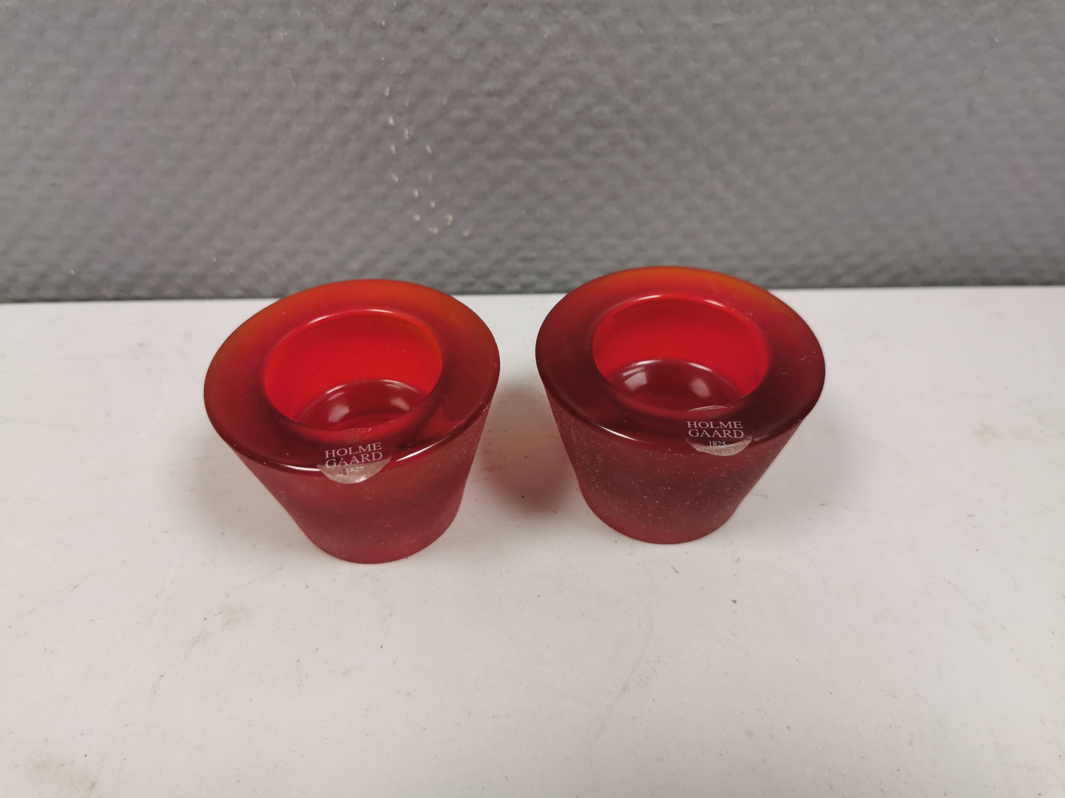 Reversible glass candlesticks with a conical shape for tealights or candles