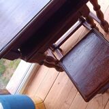 Nesting tables in oak wood. Turned wooden legs.