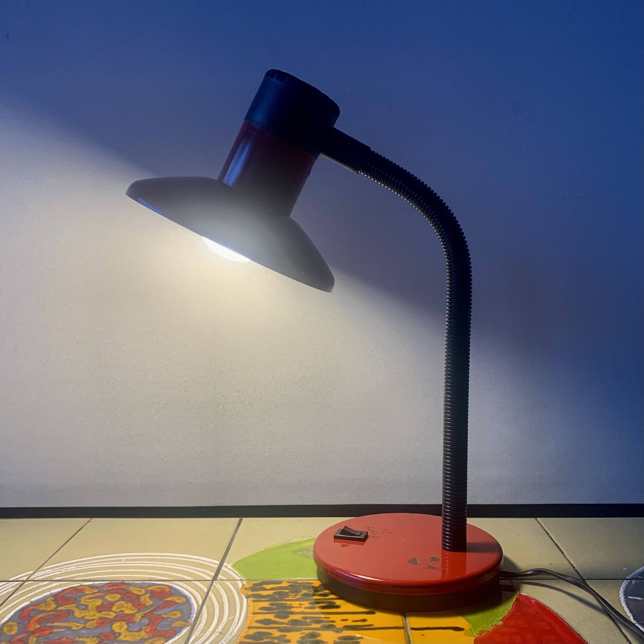 Vintage red and black metal desk lamp