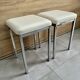Pair of vintage 1980 chrome stools with white faux leather in very good condition.
