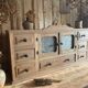 Small piece of furniture with glass doors and drawers