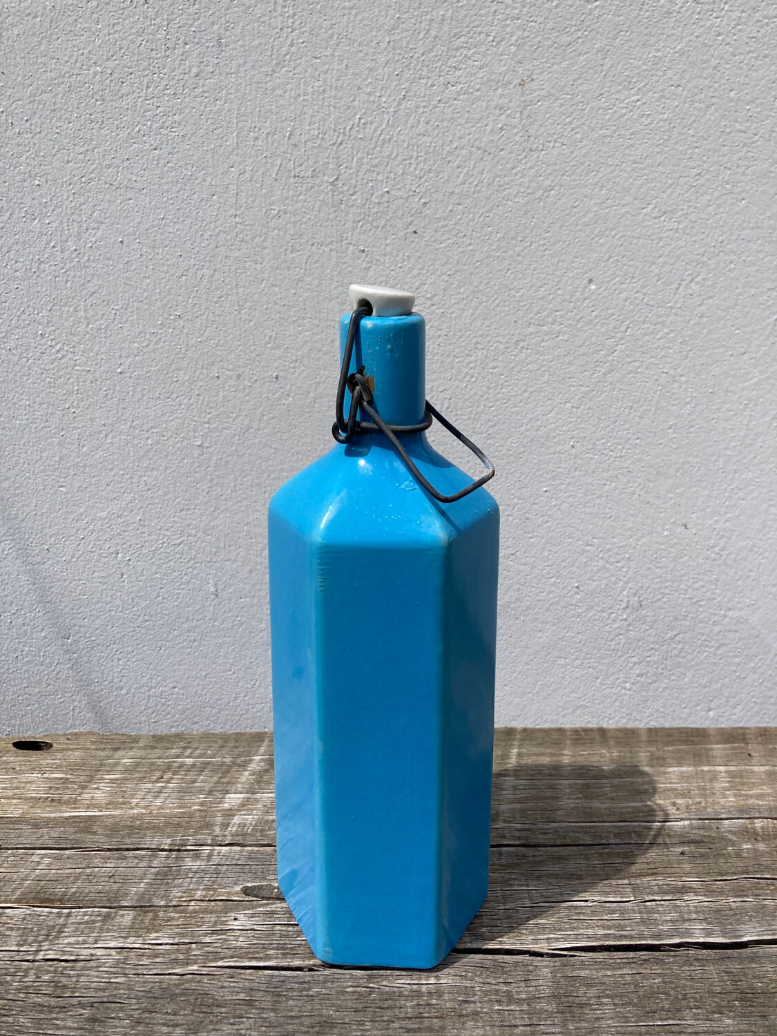 Glazed stoneware bottle signed turquoise blue
