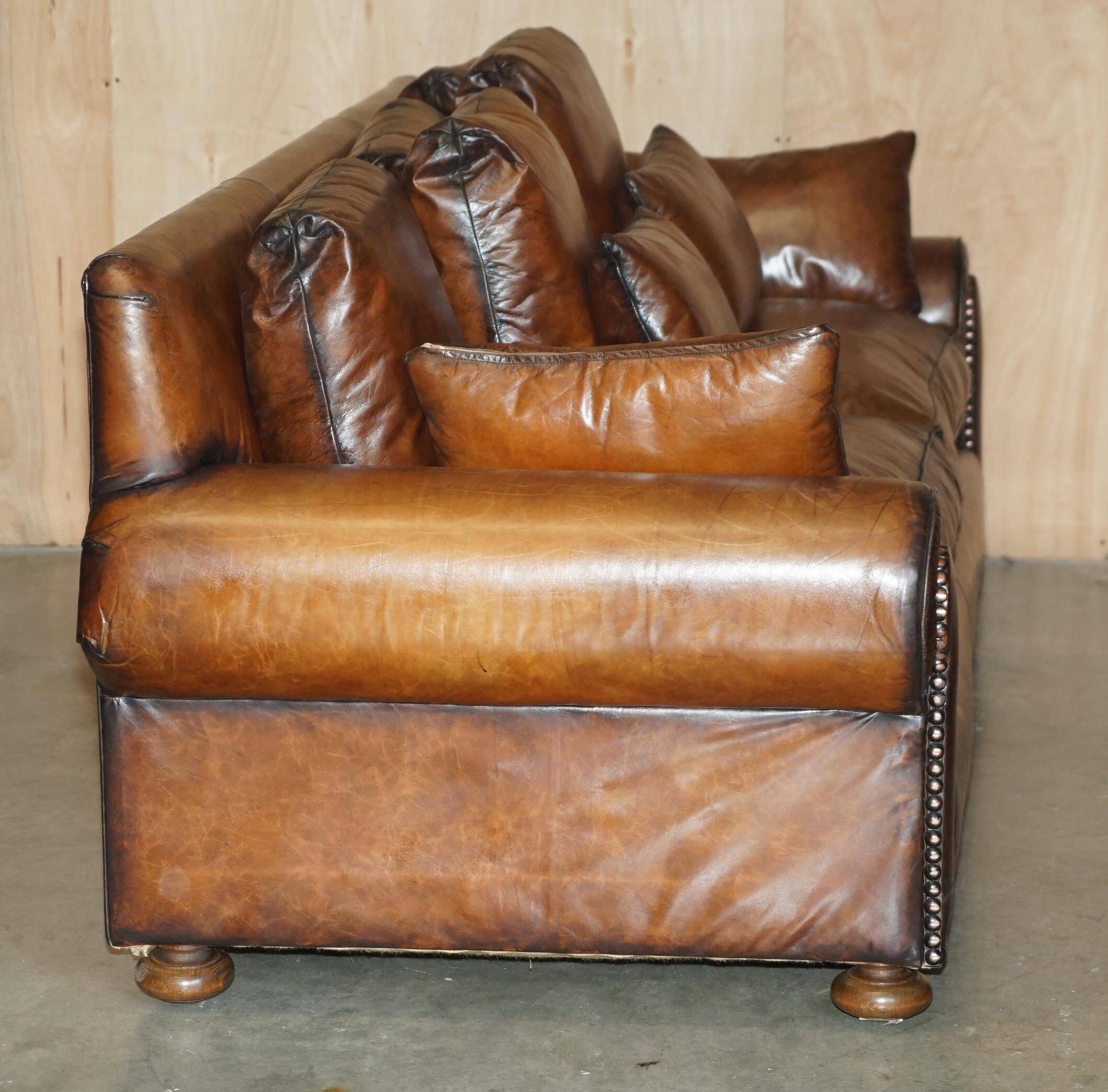 Pair of Ralph Lauren Jamaica club sofas restored in leather.