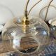 Set of three new electrified golden glass pendant lamps