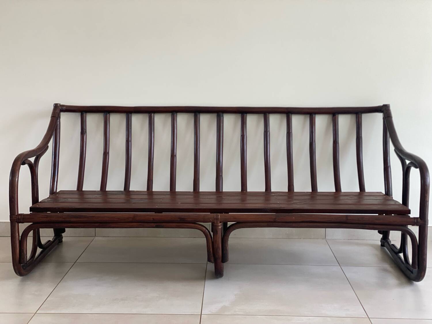 Vintage rattan bench from Maison Kok