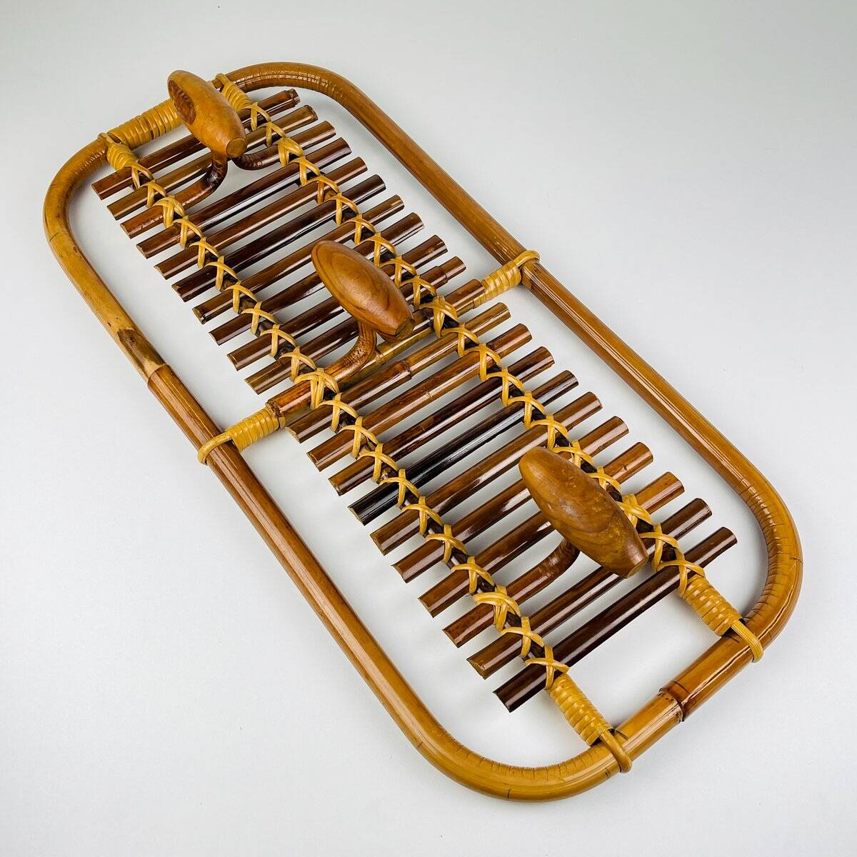Bamboo and rattan coat rack in mid-century style attributed to Olaf Von Bohr, Italy, 1950s.