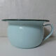 Old green enamelled steel pot cover