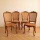 Set of 4 Regency chairs in caned cherry wood.