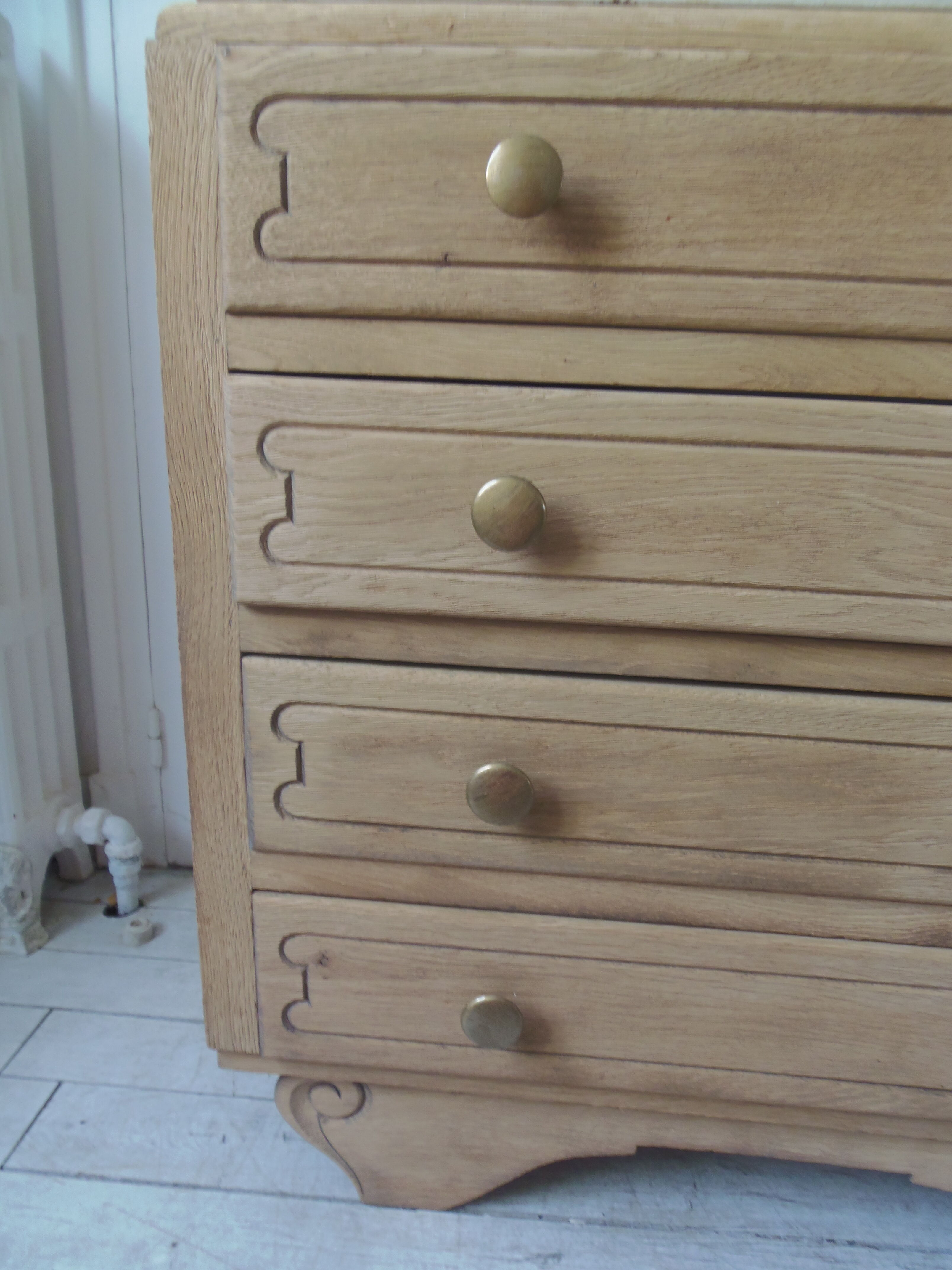 Vintage oak chest of drawers, a travertine plate laid for tray.