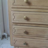 Vintage oak chest of drawers, a travertine plate laid for tray.