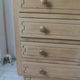 Vintage oak chest of drawers, a travertine plate laid for tray.