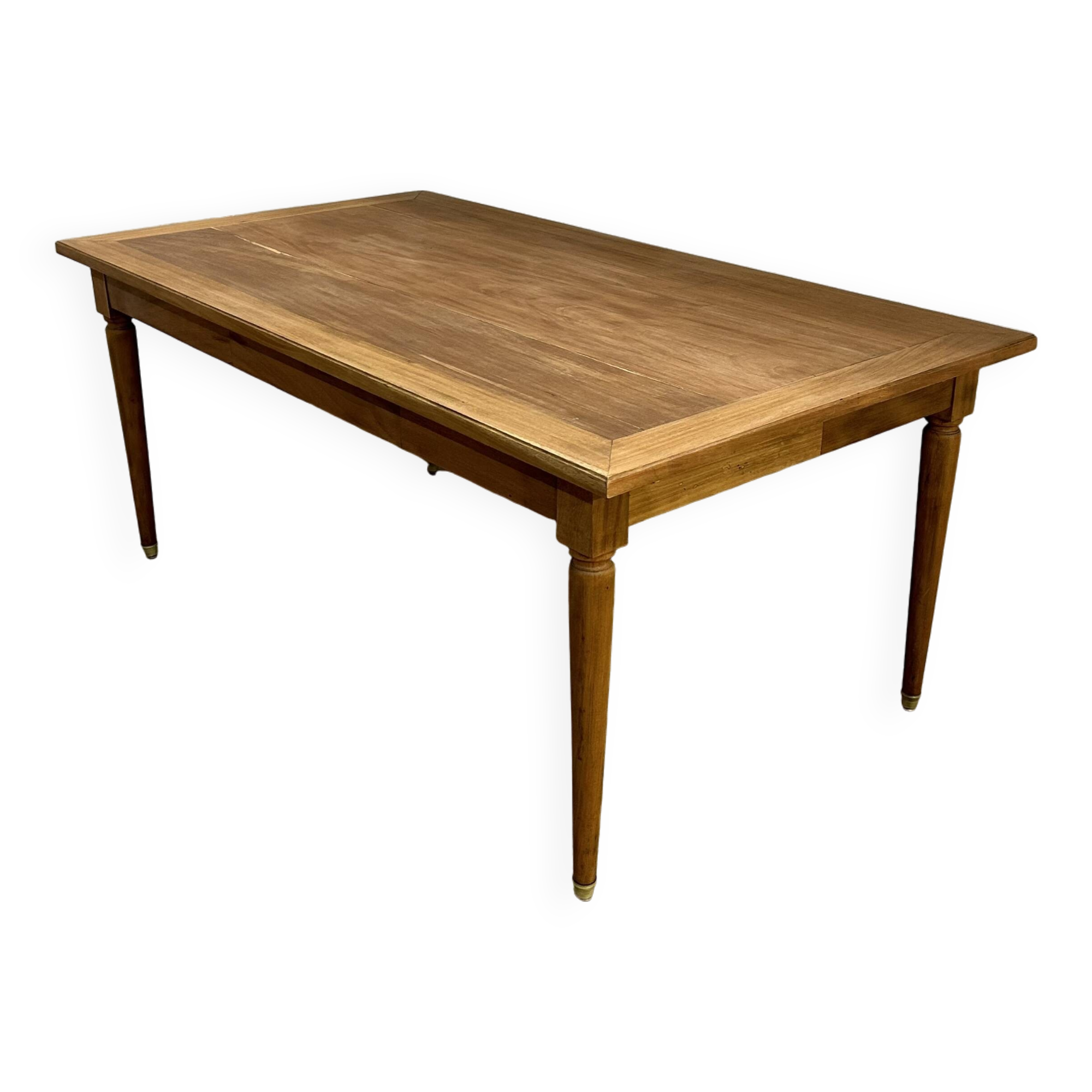 Dining table with tapered legs and solid exotic wood