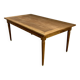 Dining table with tapered legs and solid exotic wood