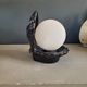 Vintage shell lamp in black porcelain with opaline globe.