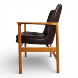 Fröscher leather armchair by Ib Kofod-Larsen, 1960