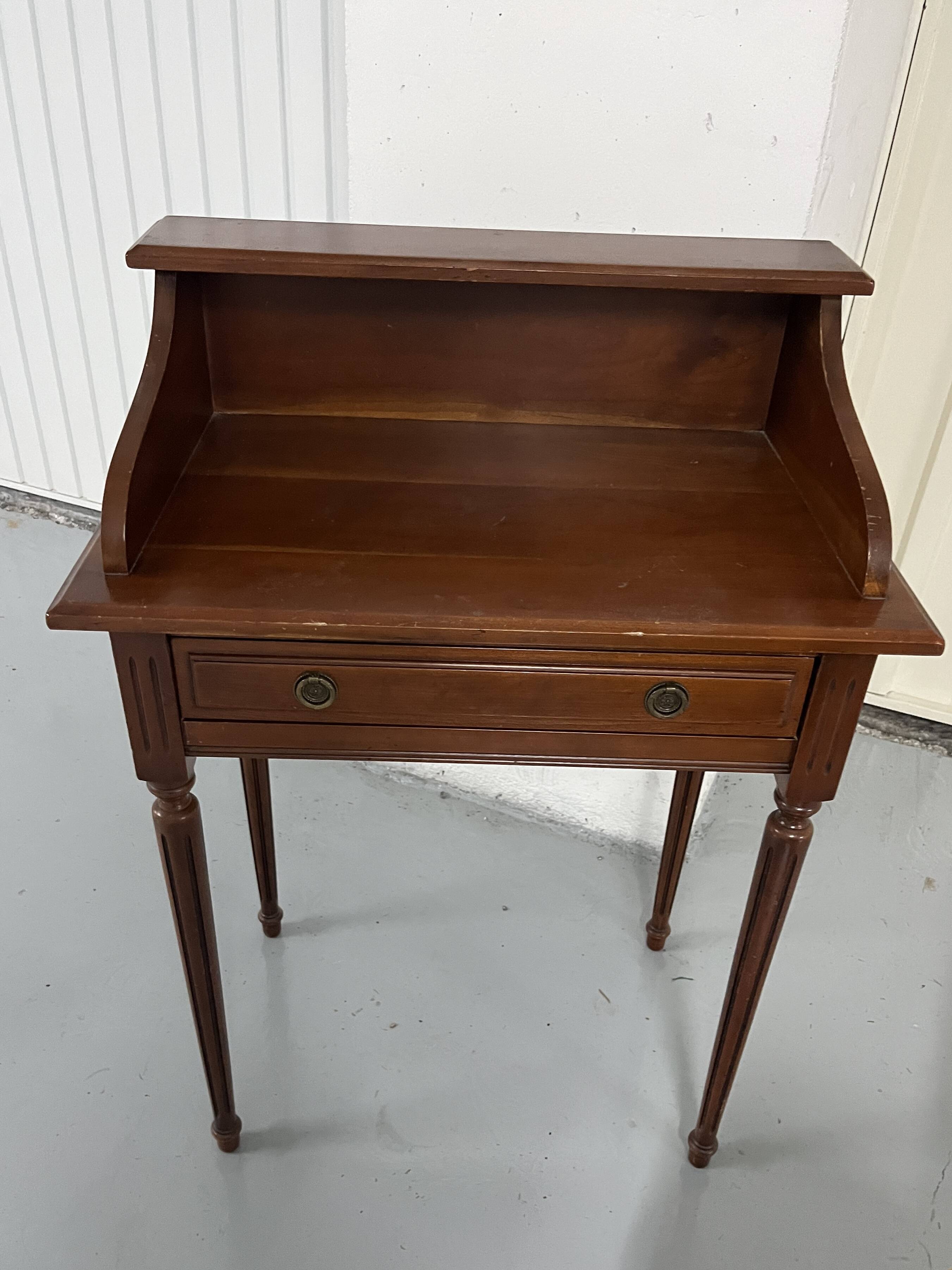 Old-fashioned secretary desk and chair set.