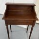 Old-fashioned secretary desk and chair set.