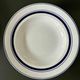Set of 9 vintage deep plates with blue patterns.