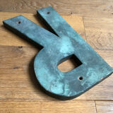 Ancient letter r sign metal painted