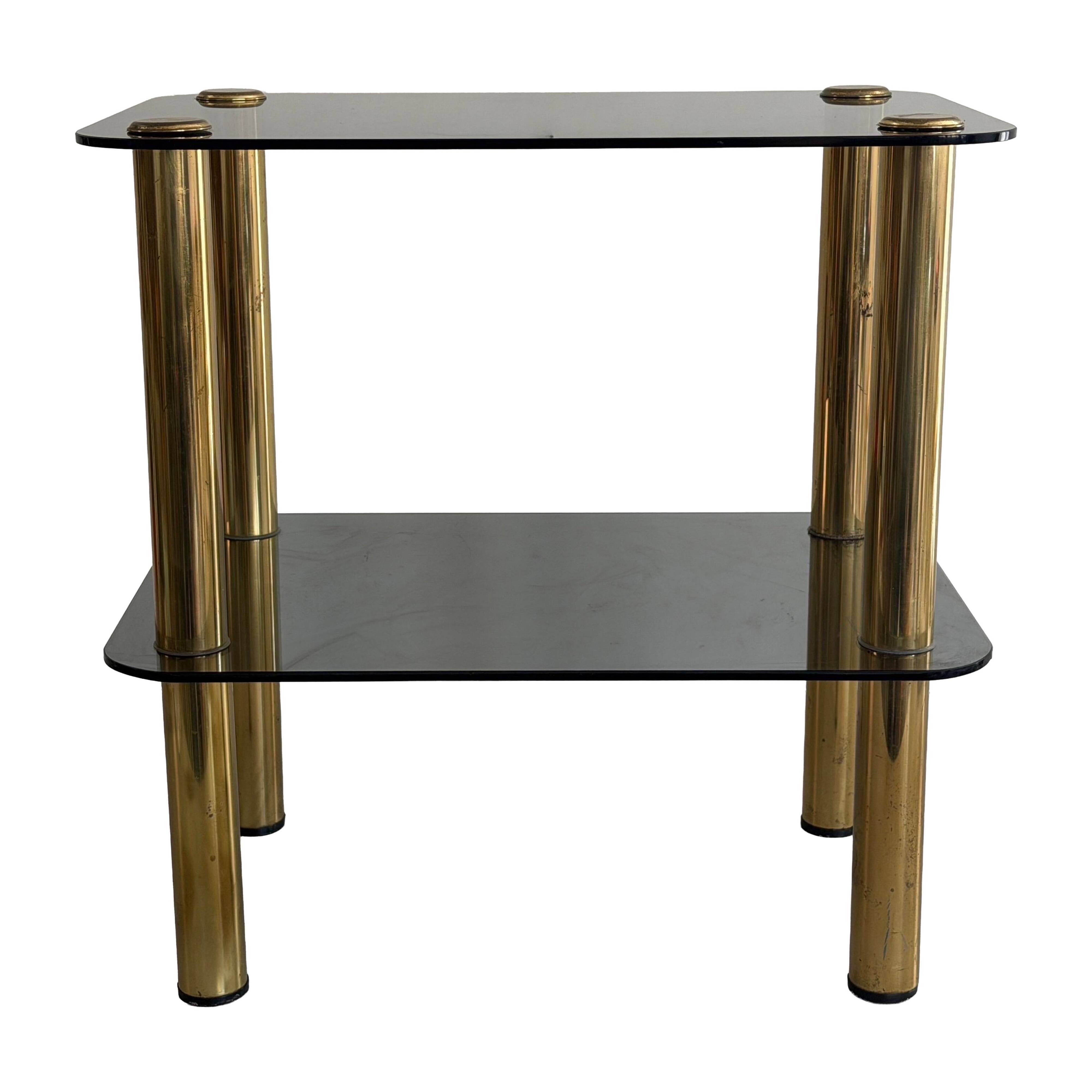 Side table in thick greenish glass with brass legs, Italy, 1960s.