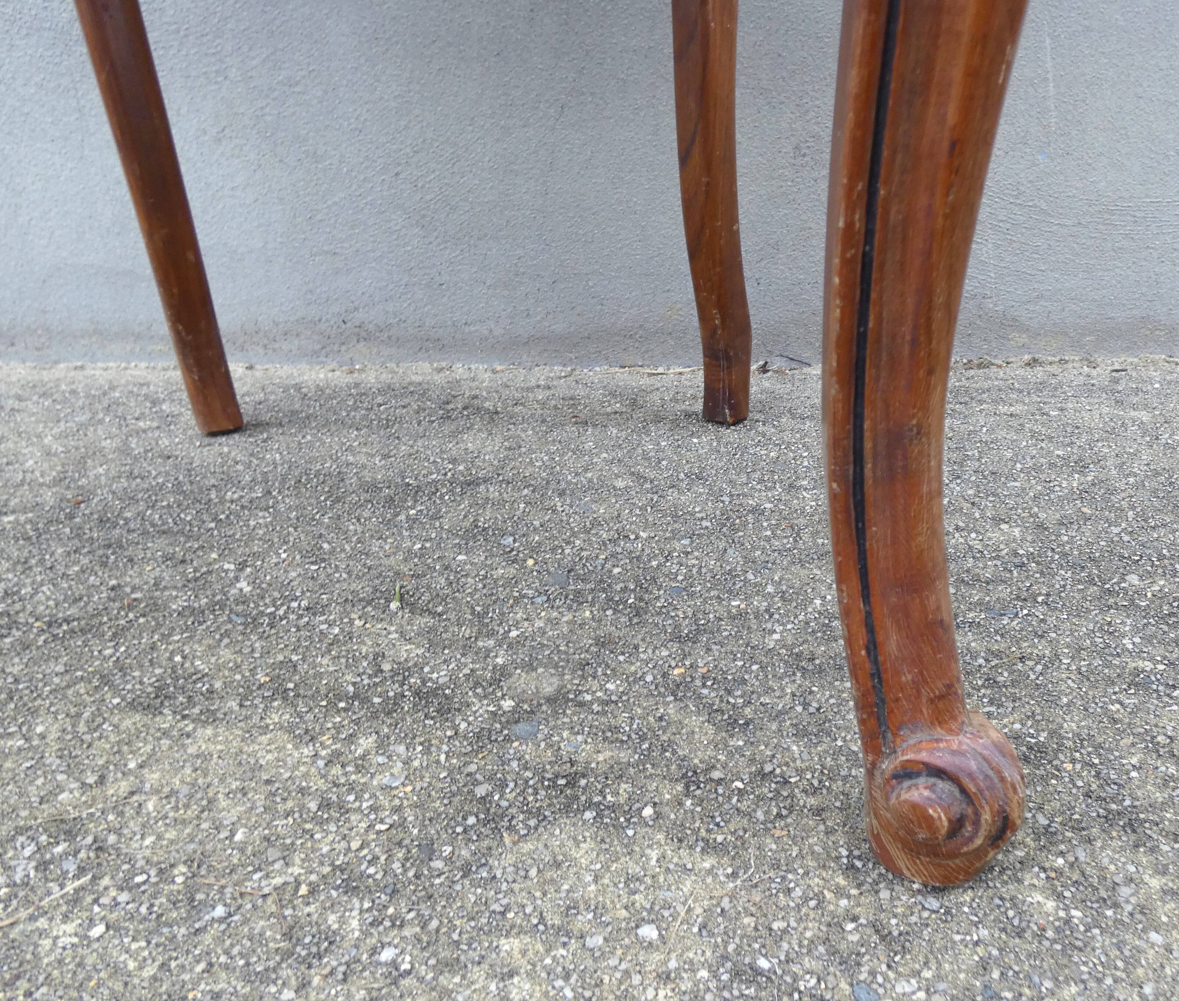 4 caned wooden chairs