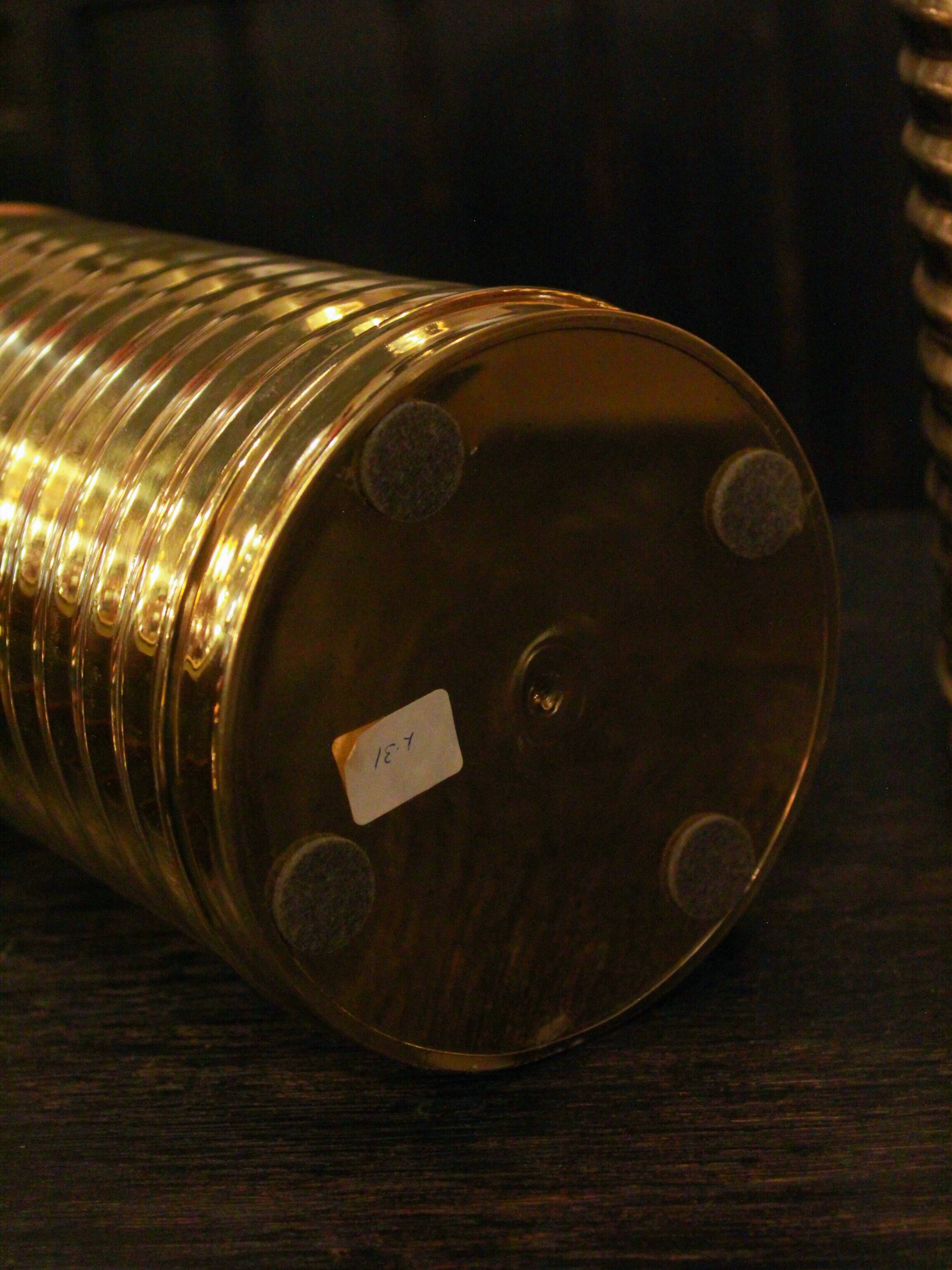 Pair of lamps in gilded brass