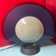 Lampe tournante Gong de Bruno Gecchelin, Arteluce Italie design