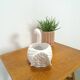 vintage porcelain flower pot in the shape of a swan