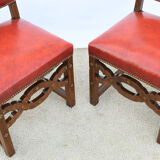 6 red leather chairs