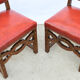 6 red leather chairs