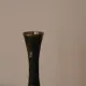 Vintage brass soliflore vase with black, red, and green floral decoration – H 18 cm