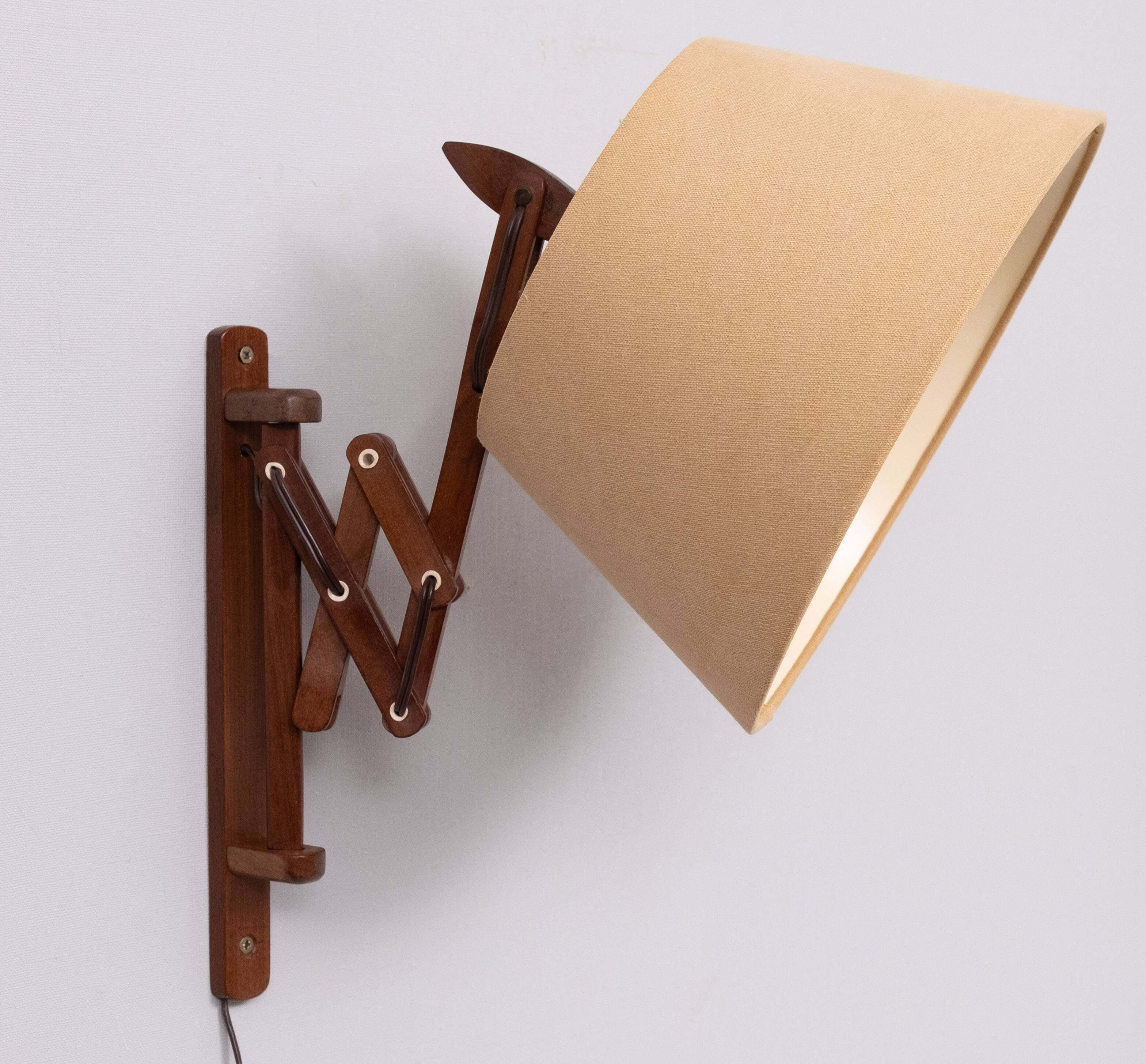 Small teak scissors wall lamp 1960s holland