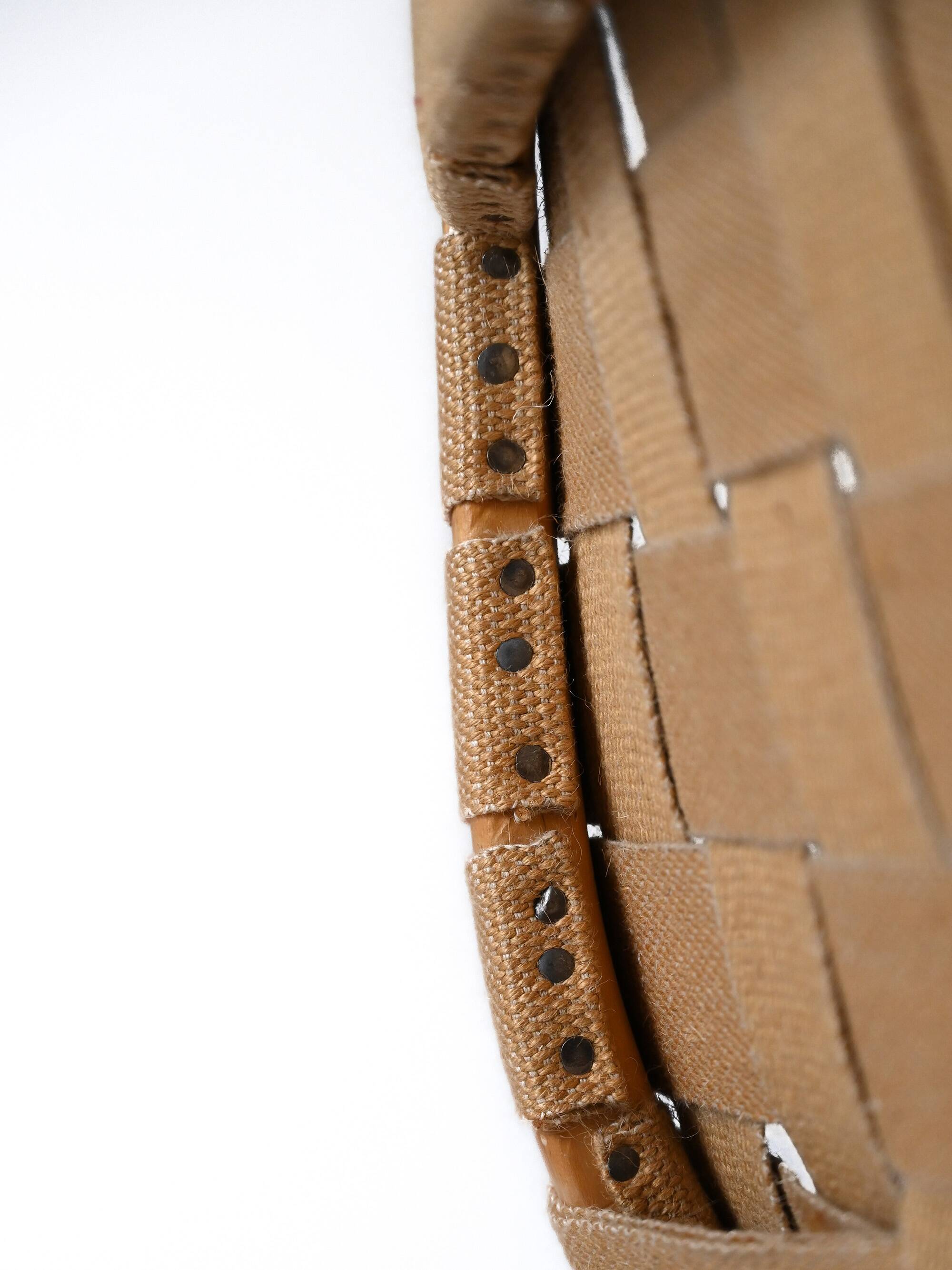 “Pernilla” armchair and footstool designed by Bruno Mathsson
