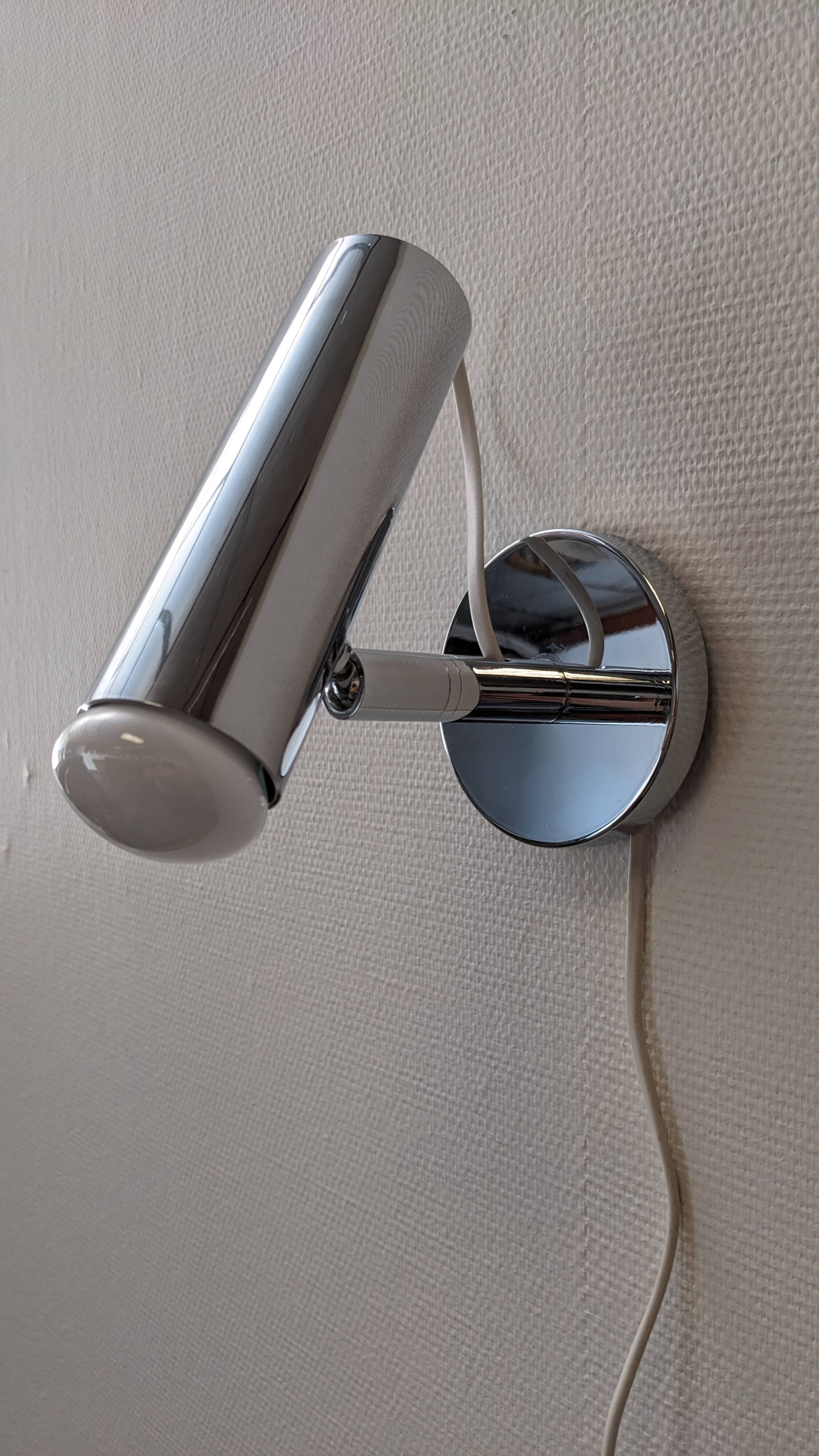 Modernist chrome metal wall light, France circa 1970.