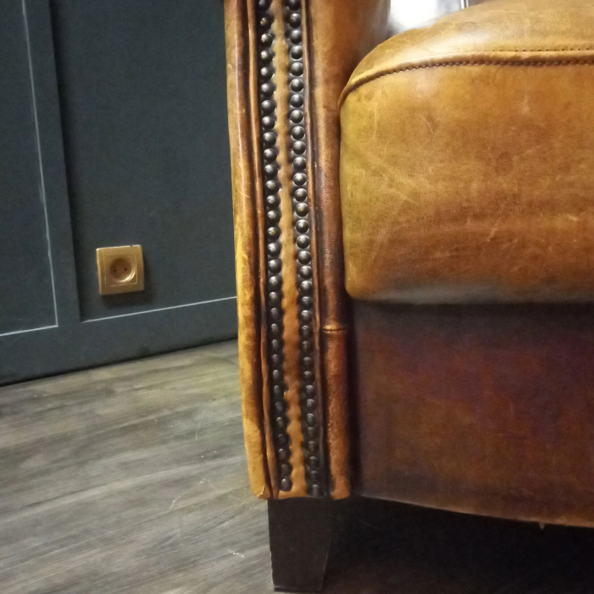 Robust vintage sheepskin armchair
