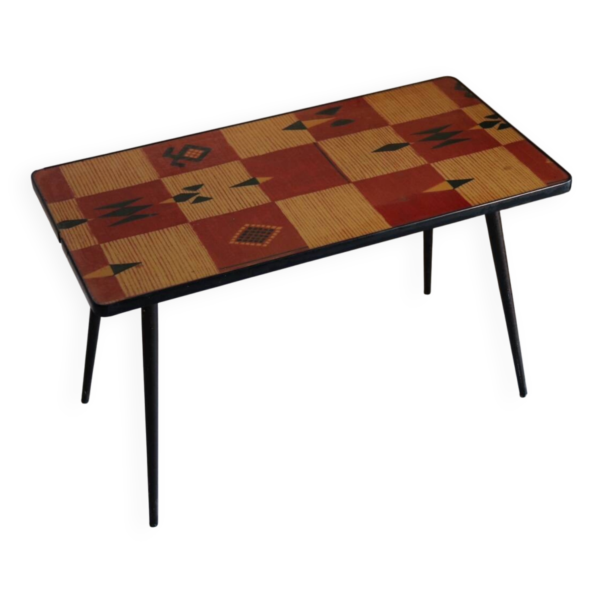 Vintage coffee table in laminate with geometric design, with tapered legs.