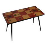Table basse vintage en stratifié à décor géométrique, piètement compas