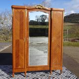 Louis XVI armoire with marquetry and gilded bronze