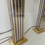 Pair of black and gold art deco style lamps