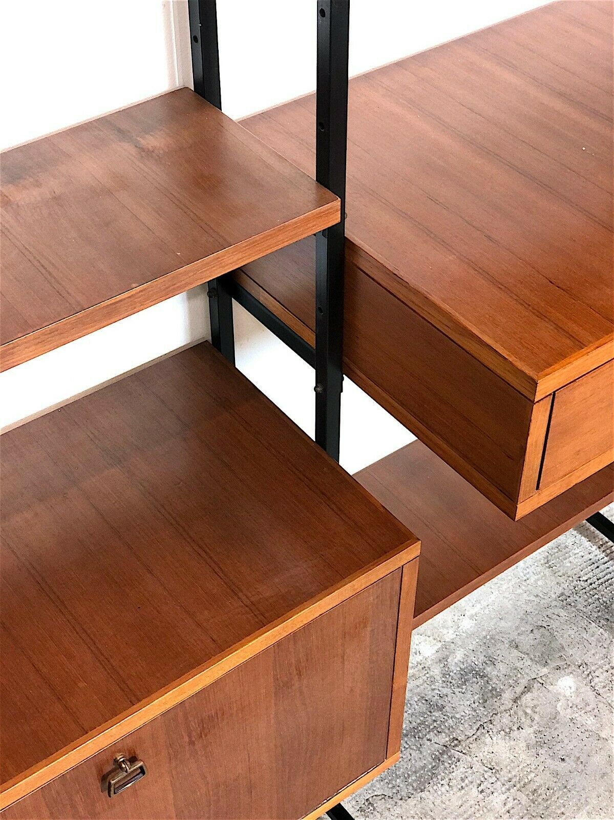 Modular storage unit and teak bookcase. Italy, 60s