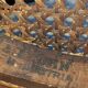 Curved wooden piano stool