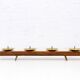 Wooden and brass candle holder