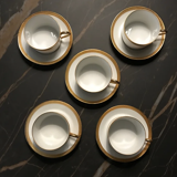 5 Haviland tea cups and sub-cups