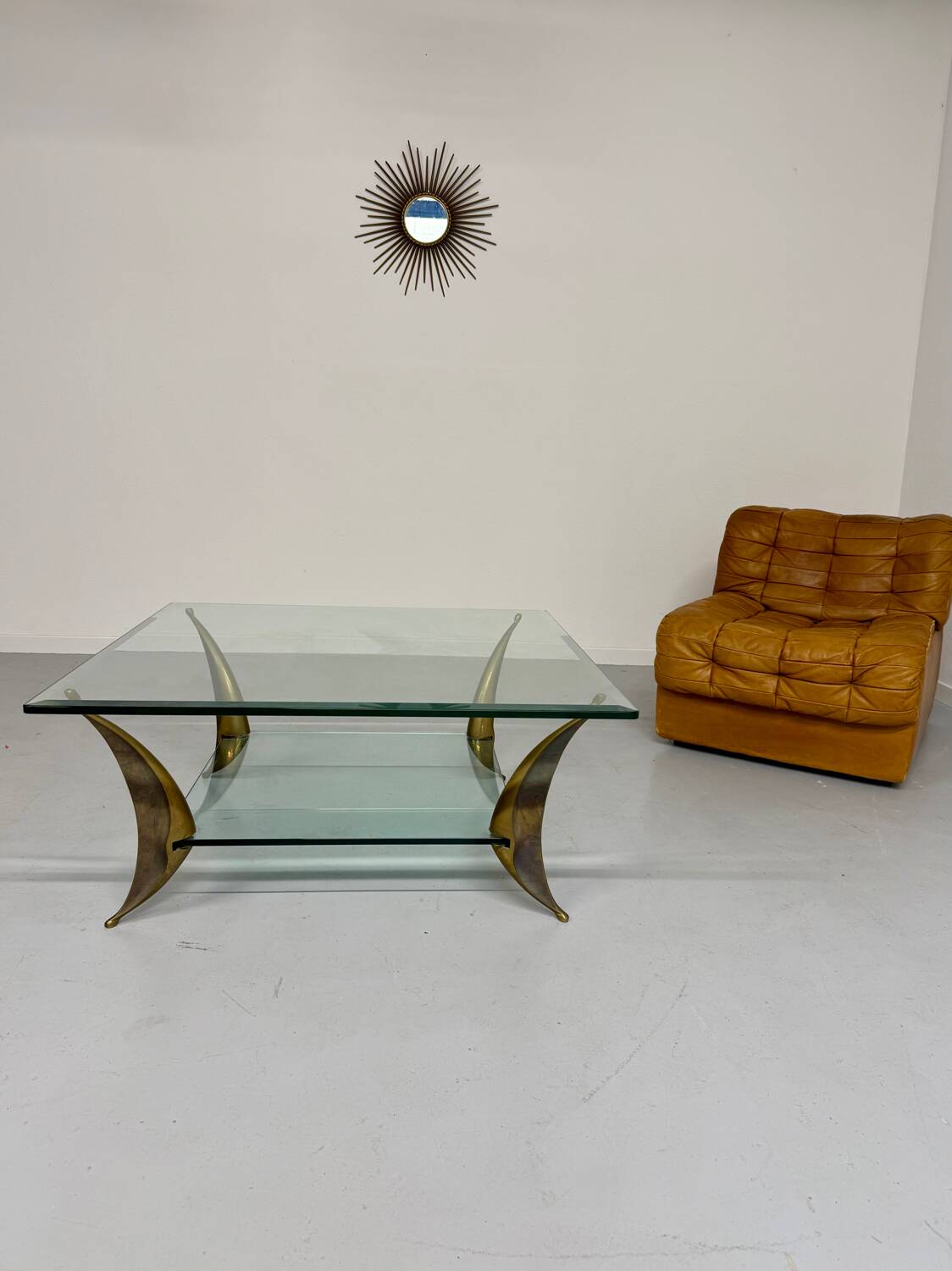 Glass coffee table with solid brass legs, Italian design from the 60s