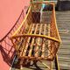 Bamboo and rattan baby cot with canopy.