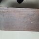 Breton carved wooden top signed E Le Nauthiec
