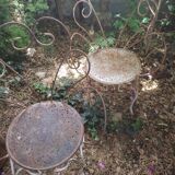 Duo of iron lawn chairs