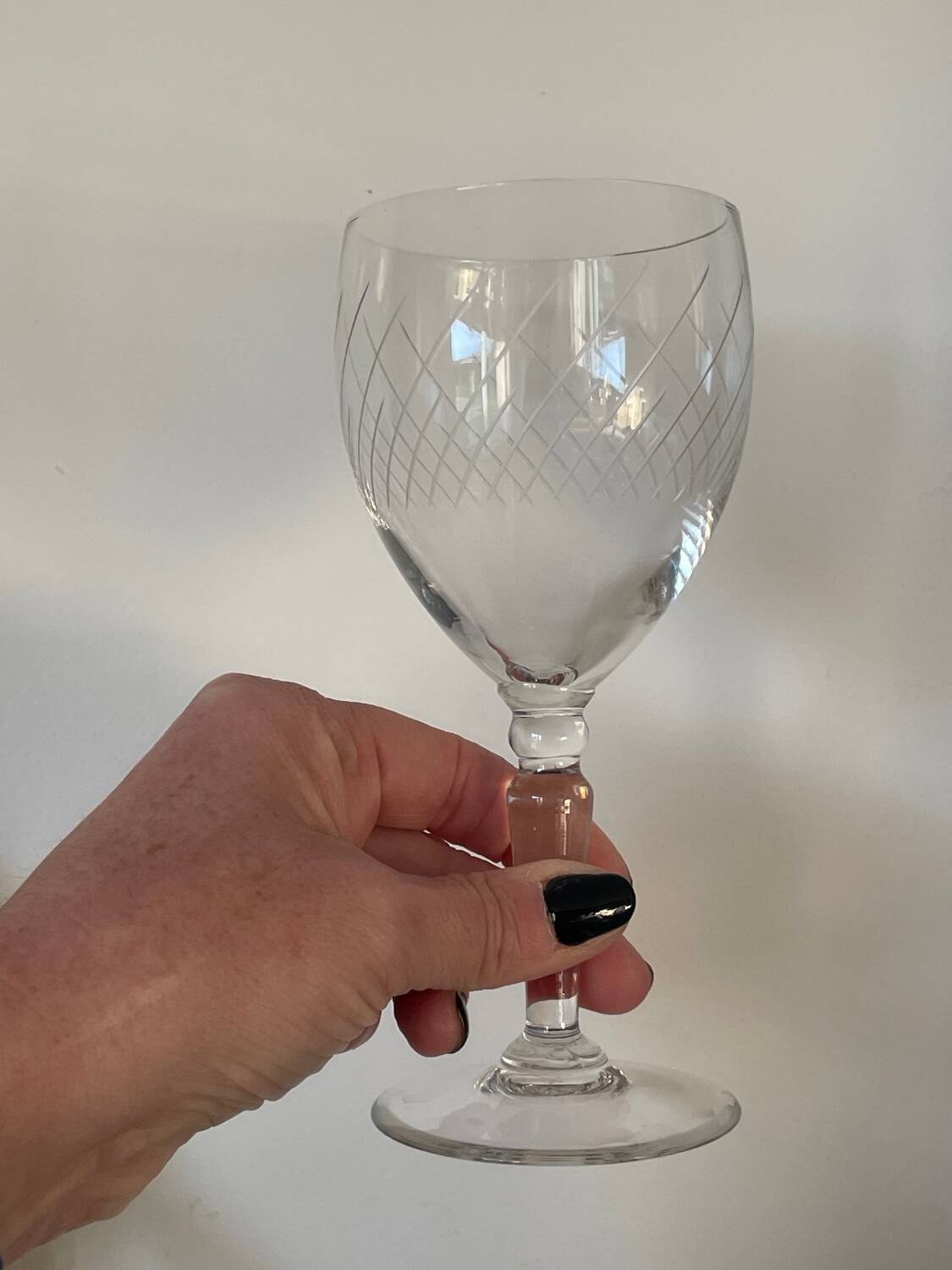 4 crystal wine glasses with stems