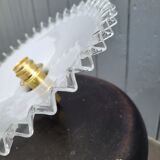 Serrated opaline suspension